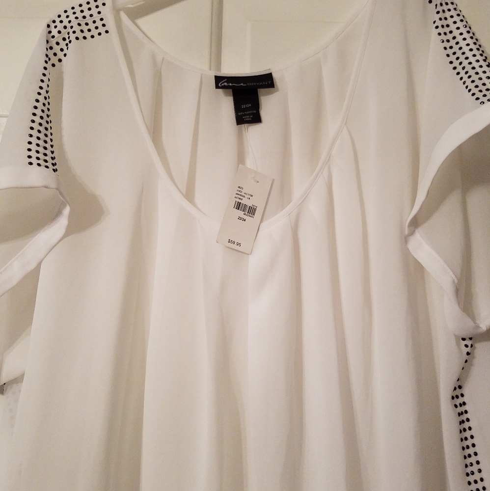 White sheer blouse with black stud trim.
